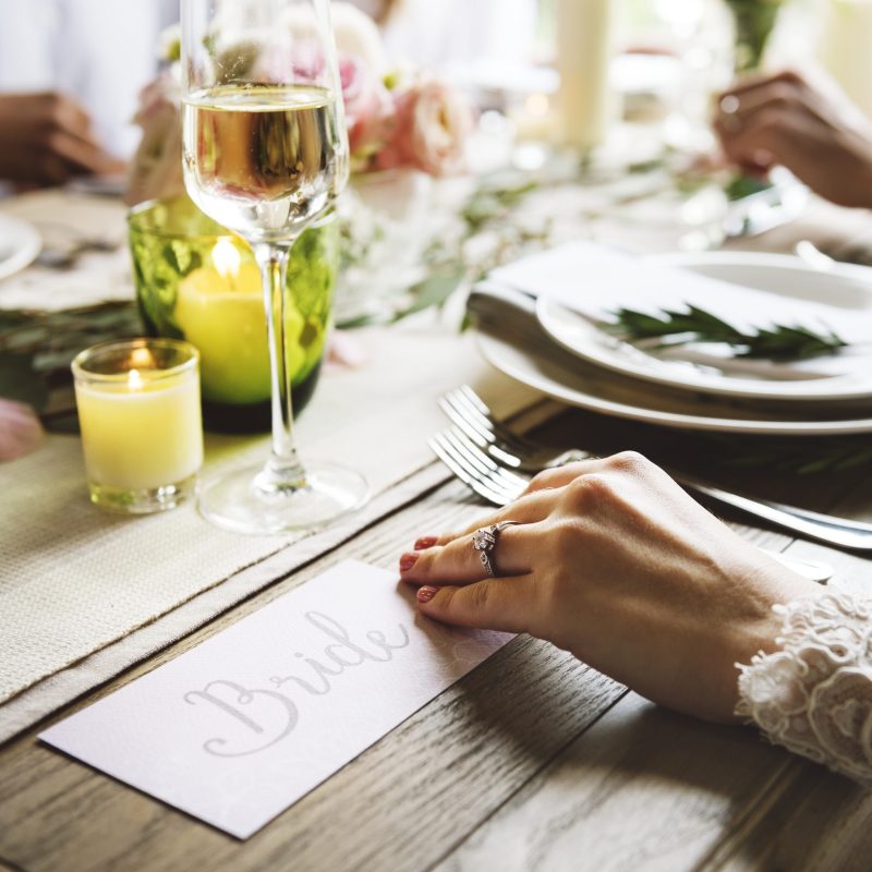SQUAREbride-showing-enagaement-ring-on-left-hand-on-wedd-4VMK2FT-scaled.jpg SQUAREbride-showing-enagaement-ring-on-left-hand-on-wedd-4VMK2FT-scaled.jpg
